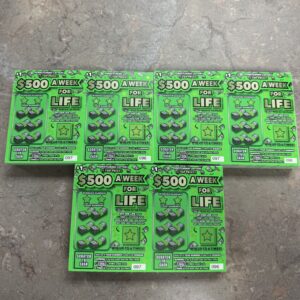3 $1.00 books of lotto tickets #1049